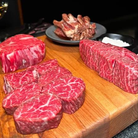 COTE Korean Steakhouse signature dishes American Wagyu Cote Steak
USDA Prime Dry Aged Ribeye
Kimchi Wagyu Paella